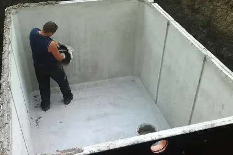 Ile kosztuje budowa szamba betonowego? Sprawdź ceny i ukryte wydatki