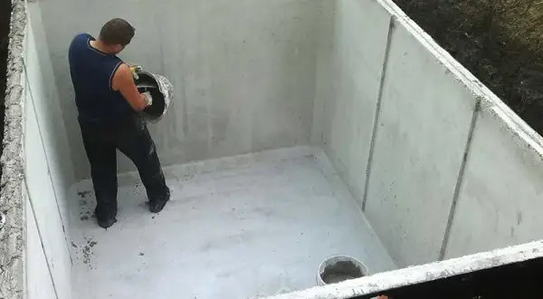 Ile kosztuje budowa szamba betonowego? Sprawdź ceny i ukryte wydatki