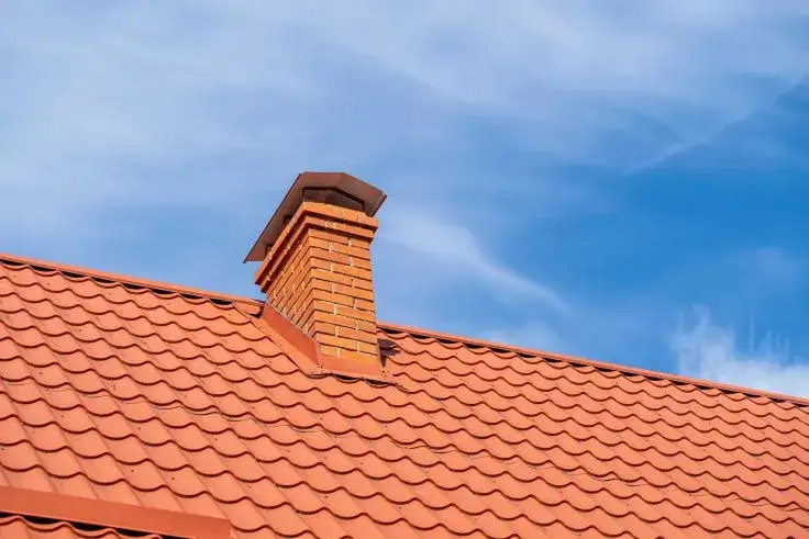 Zdjęcie Ile kosztuje budowa komina systemowego? Sprawdź, co wpłynie na cenę!